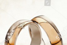 stock-photo-panoramic-banner-of-two-upright-gold-wedding-bands-symbolic-of-love-and-romance-on-a-textured-517467259 copy